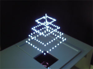 "Dots" of plasma created by lasers create a three dimensional figure in open air - Courtesy AIST